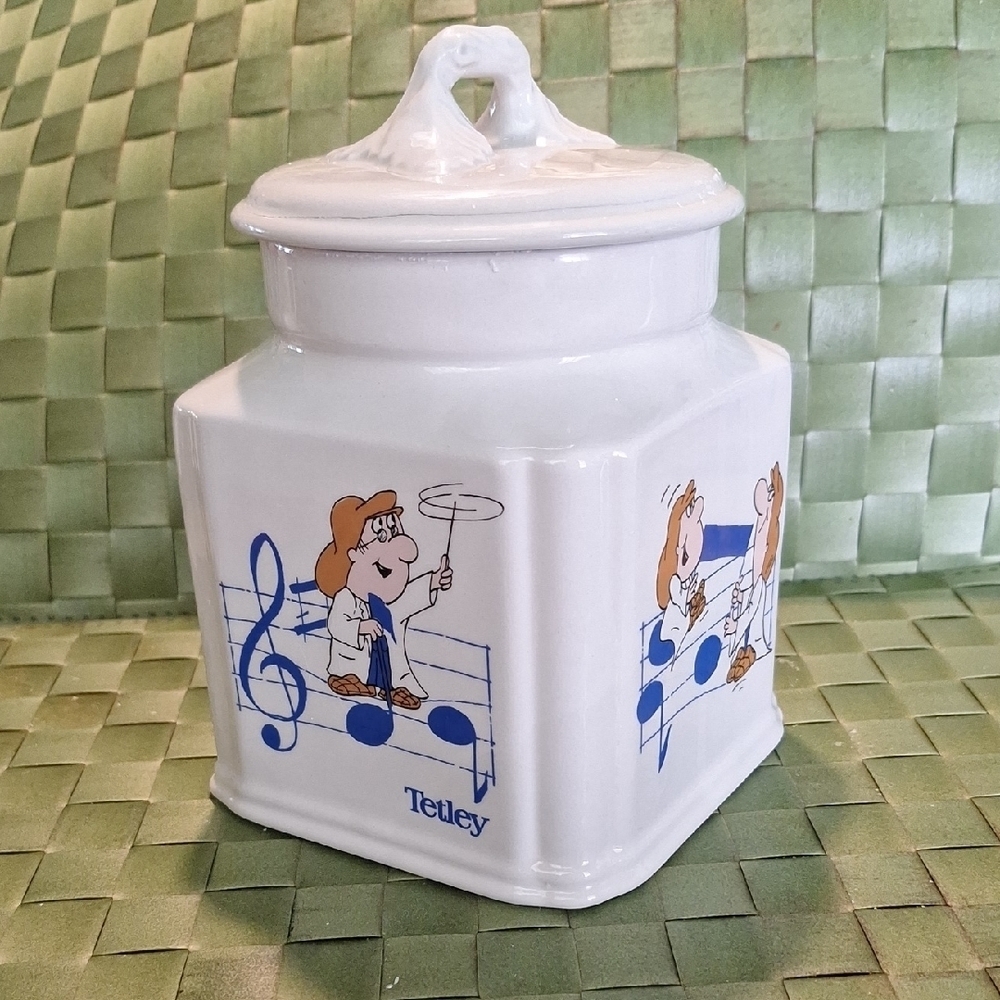 White Ceramic Tea Canister with Blue Musical Design